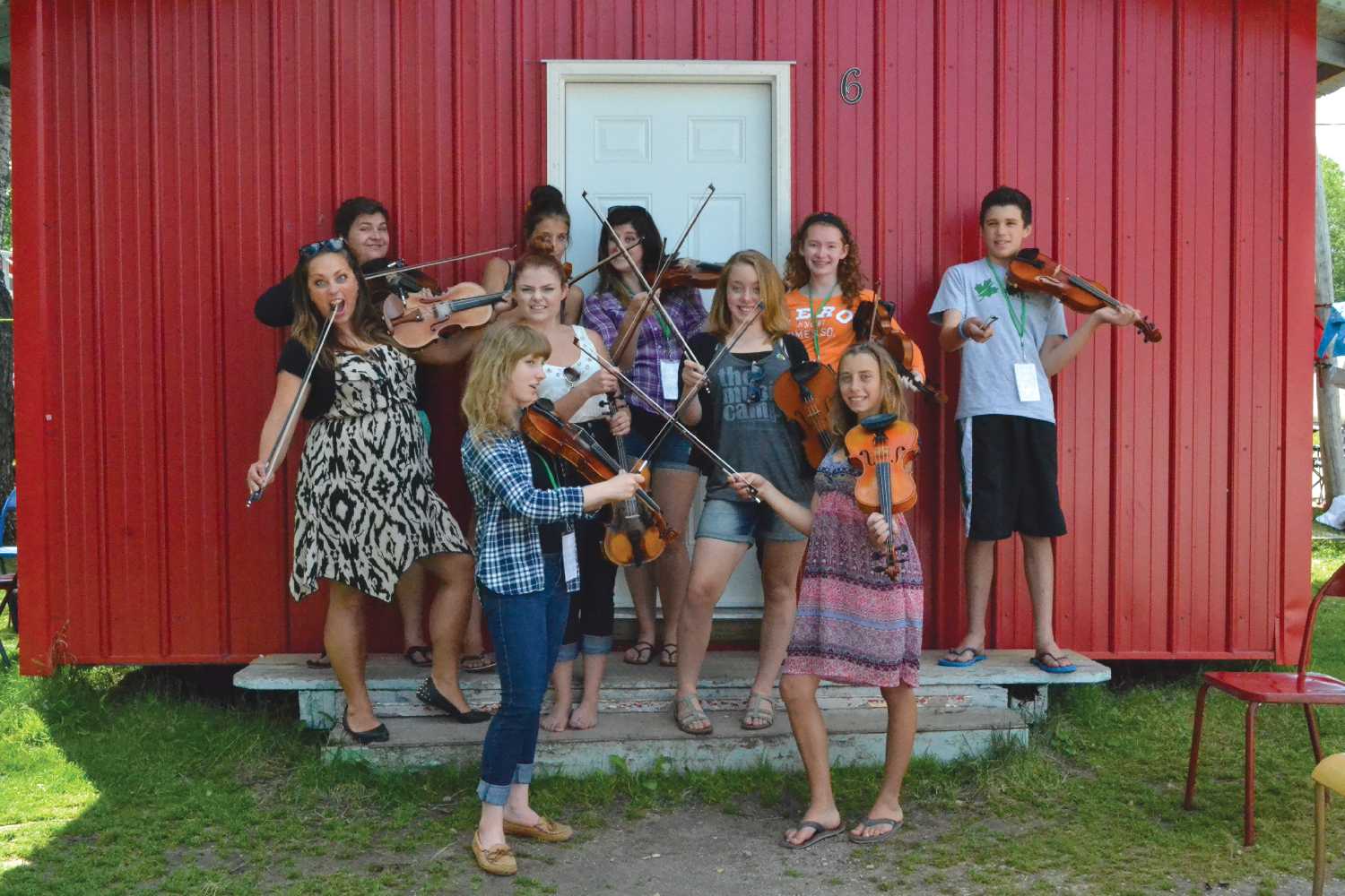 Some students who were part of Kenosee Lake Kitchen Party in previous years. The kitchen party offers musical camp activities and lessons, and festivals for all ages at Kenosee Lake for two weeks in August.